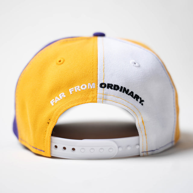 Colour Block New Era Snapback in gold and white, back view with Far From Ordinary embroidery